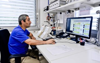 An engineer performing a leak tester calibration using an ATEQ CDF